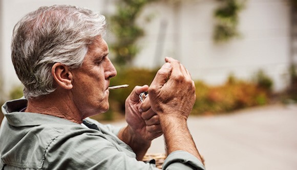 upscale senior patients enjoy fresh cannabis flower from the leaf
