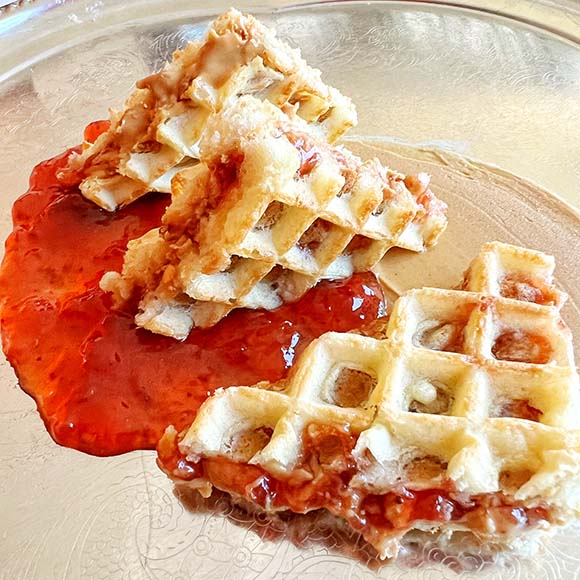 Lightly toasted peanut butter and jelly waffles